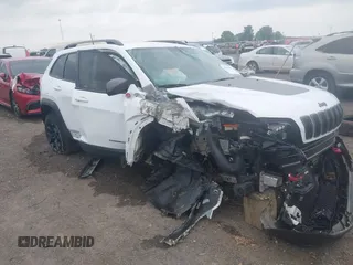 2021 Jeep Cherokee Trailhawk with VIN 1C4PJMBX4MD239112, listed as a IAAI auction lot 42271040 with 62,917 mi miles and . Bid and sale history available at DreamBid. Image 6.