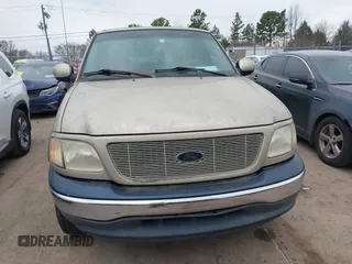 2000 Ford F-150 XL z VIN 1FTRX07W8YKA26326, wystawiony jako IAAI lot #41684242 z przebiegiem 222 808 mil mil oraz . Historia ofert i sprzedaży dostępna na DreamBid. Obrazek 6.