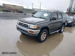 1998 Toyota 4Runner SR5 with VIN JT3HN86R1W0168185, listed as a IAAI auction lot 41936469 with 243,983 mi miles. Bid and sale history available at carsss.com. Image 2.