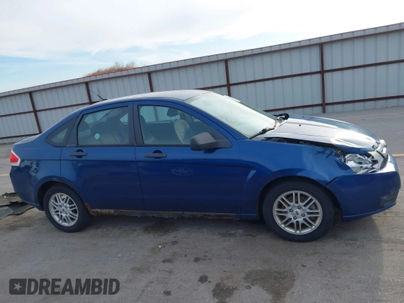 2009 Ford Focus SE with VIN 1FAHP35N39W176884, listed as a IAAI auction lot 41865864 with 193,747 mi miles. Bid and sale history available at carsss.com. Image 13.