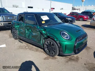 2024 MINI Hardtop 4 Door Cooper S with VIN WMW53DK01R2V69200, listed as a IAAI auction lot 40854234 with 6,716 mi miles. Bid and sale history available at carsss.com. Image 1.