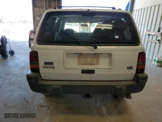 1995 Jeep Grand Cherokee Laredo with VIN 1J4GZ58Y0SC572757, listed as a Copart auction lot 52733375 with 160,588 mi miles and Salvage Title. Bid and sale history available at carsss.com. Image 6.