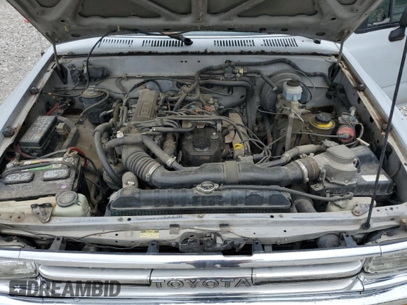 1989 Toyota Pickup DX с VIN JT4RN81PXK0034338, выставлен на аукционе Copart как лот 58797935 с пробегом 210 495 миль миль и Чистый • Clean title. История ставок и продаж доступна на DreamBid. Изображение 11.