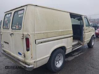 1990 Ford Econoline Cargo with VIN 1FTDE14N0LHA80405, listed as a IAAI auction lot 41824747 with 91,278 mi miles and . Bid and sale history available at DreamBid. Image 4.