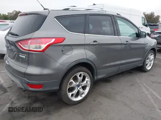2013 Ford Escape Titanium with VIN 1FMCU0J9XDUD86354, listed as a IAAI auction lot 42420780 with 260,995 mi miles and . Bid and sale history available at DreamBid. Image 4.