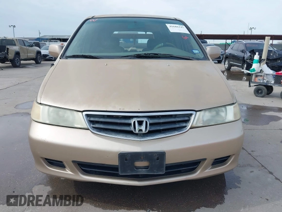 2002 Honda Odyssey EX-L z VIN 2HKRL18042H567858, wystawiony jako IAAI lot #41686147 z przebiegiem 264 570 mil mil oraz . Historia ofert i sprzedaży dostępna na DreamBid. Obrazek 12.
