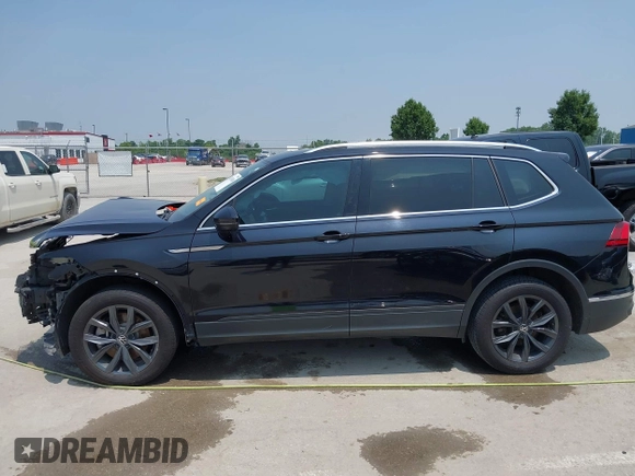 2023 Volkswagen Tiguan SE with VIN 3VVNB7AX5PM017938, listed as a IAAI auction lot 42453818 with 177,906 mi miles and . Bid and sale history available at DreamBid. Image 15.