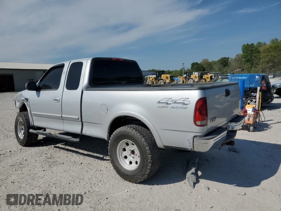 2000 Ford F-150 XL with VIN 1FTRX18L8YNB58706, listed as a Copart auction lot 53243215 with 0 mi miles and Salvage Title. Bid and sale history available at carsss.com. Image 2.