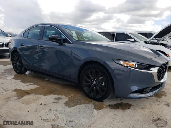 2023 Mazda Mazda3 Sedan 2.5 S Carbon Edition with VIN 3MZBPBCM0PM350179, listed as a Copart auction lot 60552874 with 2,345 mi miles and Non Repairable. Bid and sale history available at carsss.com. Image 4.