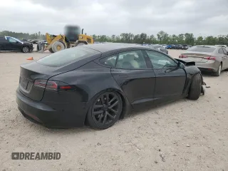 2023 Tesla Model S z VIN 5YJSA1E58PF531166, wystawiony jako Copart lot #51827565 z przebiegiem Nie podano mil oraz Szkoda całkowita • Salvage title. Historia ofert i sprzedaży dostępna na DreamBid. Obrazek 3.