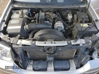 2005 GMC Envoy SLT with VIN 1GKET16M656181157, listed as a Copart auction lot 72980874 with 243,975 mi miles and Salvage Title. Bid and sale history available at DreamBid. Image 12.