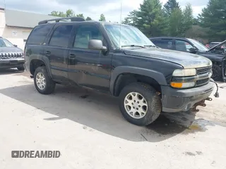 2002 Chevrolet Tahoe Z71 z VIN 1GNEK13Z62R239591, wystawiony jako IAAI lot #42522939 z przebiegiem 128 832 mil mil oraz . Historia ofert i sprzedaży dostępna na DreamBid. Obrazek 1.