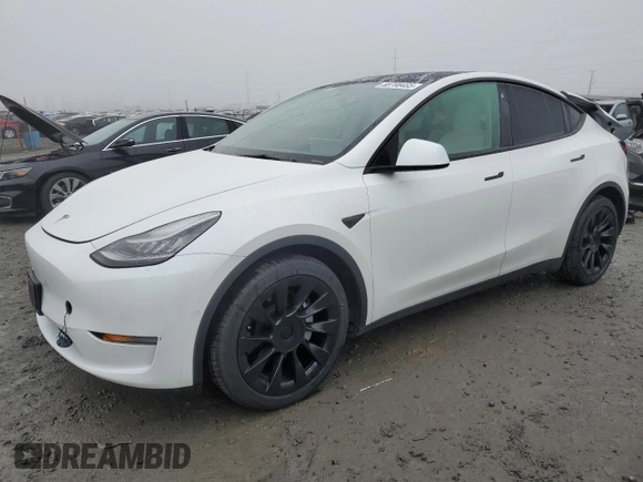 2021 Tesla Model Y Long Range with VIN 5YJYGDEE1MF267004, listed as a Copart auction lot 88708485 with 65,669 mi miles and Salvage Title. Bid and sale history available at DreamBid. Image 1.
