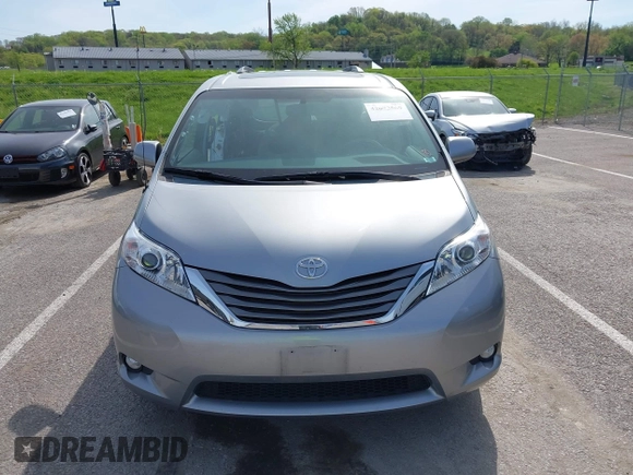 2014 Toyota Sienna XLE with VIN 5TDYK3DC0ES451307, listed as a IAAI auction lot 42093569 with 105,721 mi miles and . Bid and sale history available at DreamBid. Image 13.