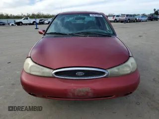 1999 Ford Contour SE с VIN 1FAFP6633XK158685, выставлен на аукционе Copart как лот 46701805 с пробегом 407 846 миль миль и Списание • Salvage title. История ставок и продаж доступна на DreamBid. Изображение 5.