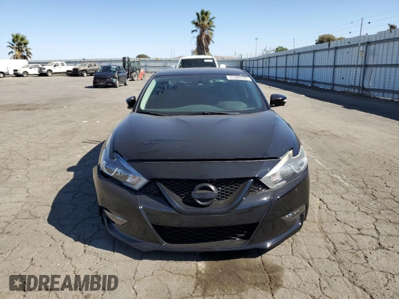 2018 Nissan Maxima SR with VIN 1N4AA6AP9JC371440, listed as a Copart auction lot 75309784 with 68,459 mi miles and Salvage Title. Bid and sale history available at carsss.com. Image 5.