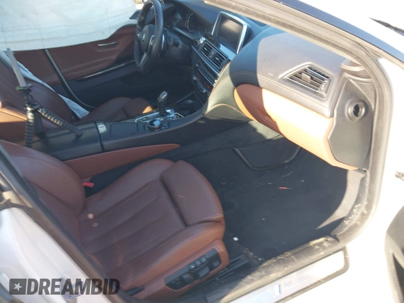 2015 BMW 6 Series 640i xDrive with VIN WBA6B8C50FD453317, listed as a IAAI auction lot 41635430 with 77,811 mi miles and . Bid and sale history available at DreamBid. Image 5.