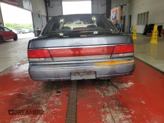 1990 Nissan Maxima с VIN JN1HJ01P3LT420451, выставлен на аукционе Copart как лот 60822275 с пробегом 146 196 миль миль и Списание • Salvage title. История ставок и продаж доступна на DreamBid. Изображение 6.