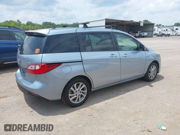 2012 Mazda 5 Sport with VIN JM1CW2BLXC0106748, listed as a IAAI auction lot 42435965 with 153,786 mi miles and . Bid and sale history available at DreamBid. Image 4.