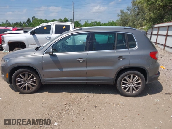 2011 Volkswagen Tiguan SEL w/Premium Navi with VIN WVGAV7AX0BW550059, listed as a IAAI auction lot 42071719 with 107,341 mi miles and . Bid and sale history available at DreamBid. Image 14.