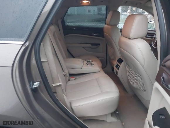 2014 Cadillac SRX Performance Collection with VIN 3GYFNCE30ES635570, listed as a IAAI auction lot 41084932 with 85,298 mi miles. Bid and sale history available at carsss.com. Image 8.