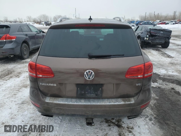 2012 Volkswagen Touareg Sport z VIN WVGEF9BP8CD006057, wystawiony jako Copart lot #47739265 z przebiegiem 213 580 mil mil oraz Szkoda całkowita • Salvage title. Historia ofert i sprzedaży dostępna na DreamBid. Obrazek 6.