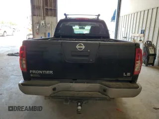 2009 Nissan Frontier LE with VIN 1N6AD09U79C409698, listed as a Copart auction lot 55843545 with 230,334 mi miles and Salvage title. Bid and sale history available at DreamBid. Image 6.