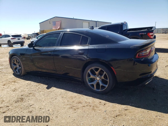 2015 Dodge Charger RT with VIN 2C3CDXCT0FH805909, listed as a Copart auction lot 42612035 with 77,493 mi miles and Salvage title. Bid and sale history available at DreamBid. Image 2.