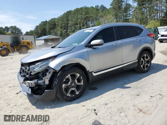 2018 Honda CR-V Touring with VIN 7FARW1H9XJE001467, listed as a Copart auction lot 55222005 with 65,611 mi miles and Salvage title. Bid and sale history available at DreamBid. Image 1.