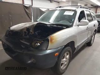 2004 Hyundai Santa Fe GLS z VIN KM8SC13D44U569562, wystawiony jako IAAI lot #42266387 z przebiegiem Nie podano mil oraz . Historia ofert i sprzedaży dostępna na DreamBid. Obrazek 2.