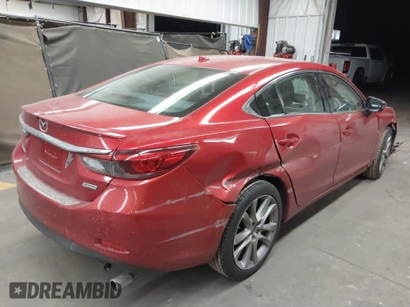 2016 Mazda 6 i Grand Touring с VIN JM1GJ1W50G1474054, выставлен на аукционе IAAI как лот 42162163 с пробегом 97 169 миль миль и . История ставок и продаж доступна на DreamBid. Изображение 4.