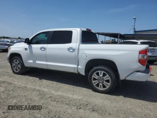 2015 Toyota Tundra Platinum with VIN 5TFAY5F19FX422570, listed as a Copart auction lot 57353475 with 238,576 mi miles and Clean title. Bid and sale history available at DreamBid. Image 2.