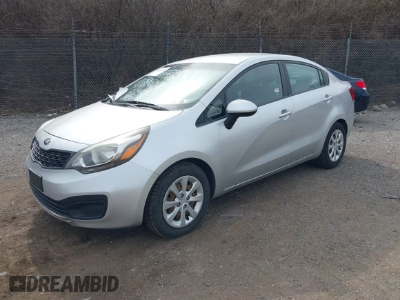 2013 Kia Rio LX with VIN KNADM4A36D6272803, listed as a IAAI auction lot 41849872 with 62,918 mi miles. Bid and sale history available at carsss.com. Image 2.