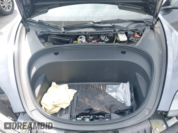 2023 Tesla Model 3 with VIN 5YJ3E1EA4PF410060, listed as a IAAI auction lot 42067624 with 59,934 mi miles and . Bid and sale history available at DreamBid. Image 10.