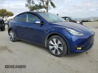 2021 Tesla Model Y Long Range with VIN 5YJYGDEEXMF192447, listed as a Copart auction lot 53550055 with 65,673 mi miles and Salvage Title. Bid and sale history available at DreamBid. Image 4.