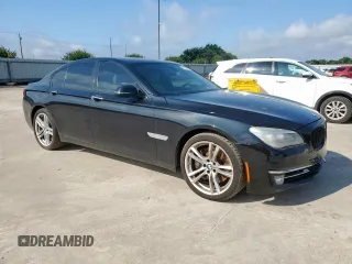 2014 BMW 7 Series 750i с VIN WBAYA8C57ED824970, выставлен на аукционе Copart как лот 61005925 с пробегом 144 457 миль миль и Чистый • Clean title. История ставок и продаж доступна на DreamBid. Изображение 4.