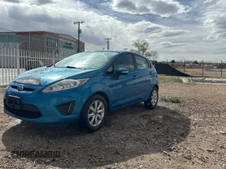 2013 Ford Fiesta SE with VIN 3FADP4EJ0DM141097, listed as a Copart auction lot 51342175 with 146,316 mi miles and Clean Title. Bid and sale history available at carsss.com. Image 2.