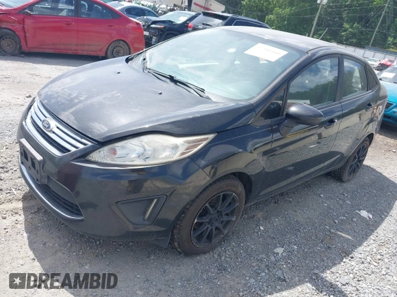 2011 Ford Fiesta SE z VIN 3FADP4BJ2BM172241, wystawiony jako IAAI lot #42500368 z przebiegiem 258 580 mil mil oraz . Historia ofert i sprzedaży dostępna na DreamBid. Obrazek 2.