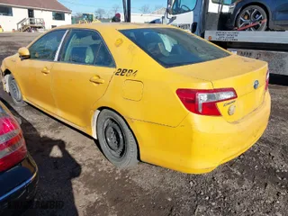 2012 Toyota Camry Hybrid XLE with VIN 4T1BD1FK1CU056792, listed as a IAAI auction lot 41436850 with 999,999 mi miles. Bid and sale history available at carsss.com. Image 3.