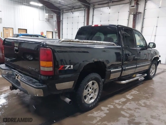 2001 Chevrolet Silverado 1500 LS with VIN 2GCEK19T211104966, listed as a IAAI auction lot 41522754 with 240,384 mi miles. Bid and sale history available at carsss.com. Image 4.