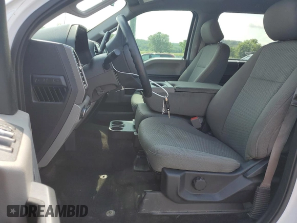 2018 Ford F-150 XL with VIN 1FTEW1CP4JKE20952, listed as a Copart auction lot 62561945 with 179,097 mi miles and Salvage title. Bid and sale history available at DreamBid. Image 7.