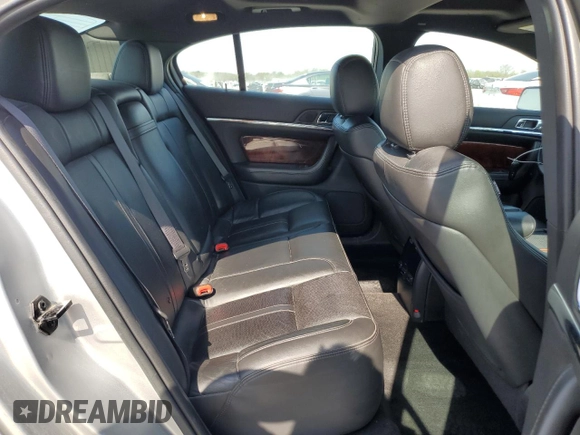 2013 Lincoln MKS with VIN 1LNHL9EK0DG612314, listed as a Copart auction lot 52901685 with 124,828 mi miles and Salvage title. Bid and sale history available at DreamBid. Image 10.
