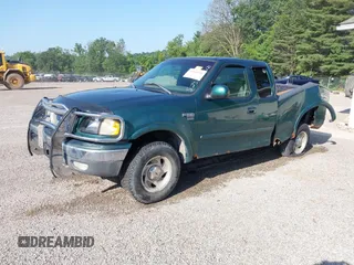 1999 Ford F-150 with VIN 1FTRX18W4XNA50527, listed as a IAAI auction lot 42563746 with 213,959 mi miles and . Bid and sale history available at DreamBid. Image 23.