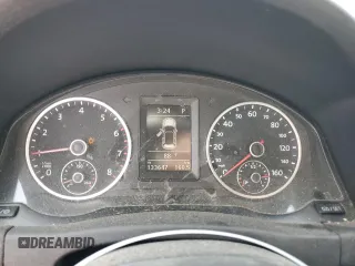 2013 Volkswagen Tiguan SE z VIN WVGBV3AX9DW603521, wystawiony jako Copart lot #59406465 z przebiegiem 133 647 mil mil oraz Szkoda całkowita • Salvage title. Historia ofert i sprzedaży dostępna na DreamBid. Obrazek 9.