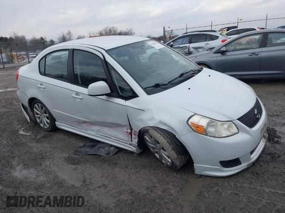 2010 Suzuki SX4 with VIN JS2YC5A43A6300225, listed as a IAAI auction lot 41654094 with 60,098 mi miles and . Bid and sale history available at DreamBid. Image 1.