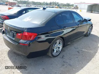 2014 BMW 5 Series 535d with VIN WBAXA5C58ED690447, listed as a IAAI auction lot 41577468 with 149,080 mi miles and . Bid and sale history available at carsss.com. Image 4.