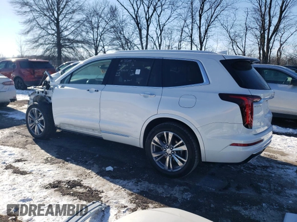 2022 Cadillac XT6 Premium Luxury with VIN 1GYKPCRS0NZ173802, listed as a Copart auction lot 87419534 with 28,373 mi miles and Salvage Title. Bid and sale history available at carsss.com. Image 2.