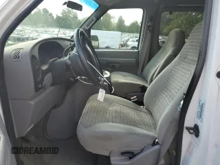 2002 Ford Econoline Passenger XL with VIN 1FMRE11WX2HA57114, listed as a Copart auction lot 68766174 with 167,382 mi miles and Salvage Title. Bid and sale history available at DreamBid. Image 7.