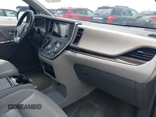 2015 Toyota Sienna XLE with VIN 5TDYK3DCXFS688971, listed as a IAAI auction lot 42127912 with 143,024 mi miles. Bid and sale history available at carsss.com. Image 5.