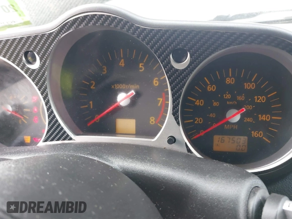 2003 Nissan 350Z Touring z VIN JN1AZ34E33T003711, wystawiony jako IAAI lot #41351191 z przebiegiem 167 503 mil mil oraz . Historia ofert i sprzedaży dostępna na DreamBid. Obrazek 7.